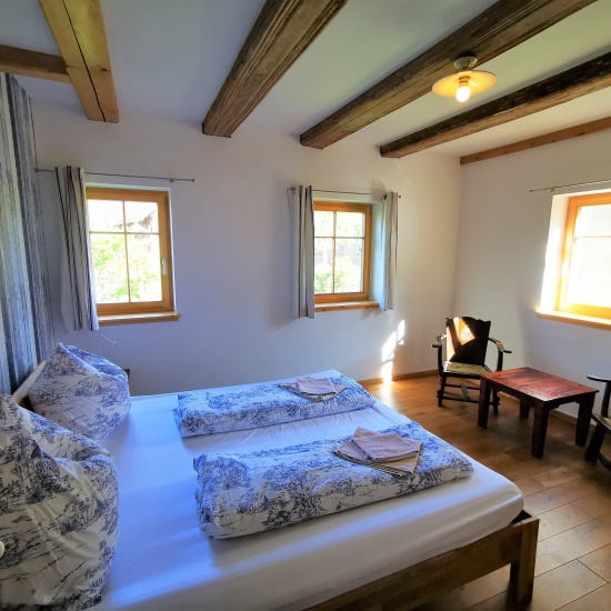 Ferienhaus »Haus anno 1750« - Schlafzimmer im Erdgeschoss